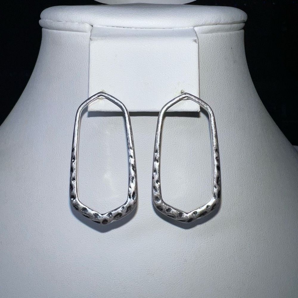 Silver Tone Diamond Cut Long Oval Earrings